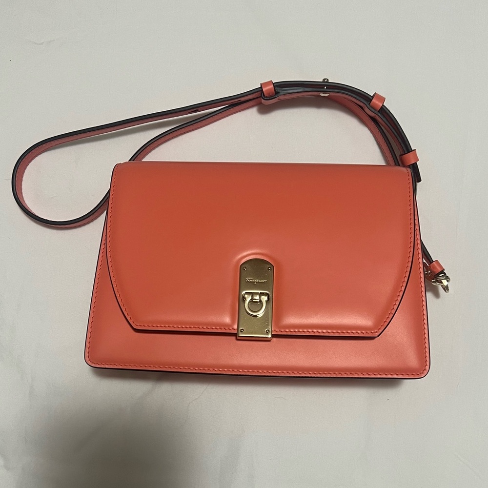 Brand new summer orange Ferragamo Handbag. Real leather. No scratches. New!